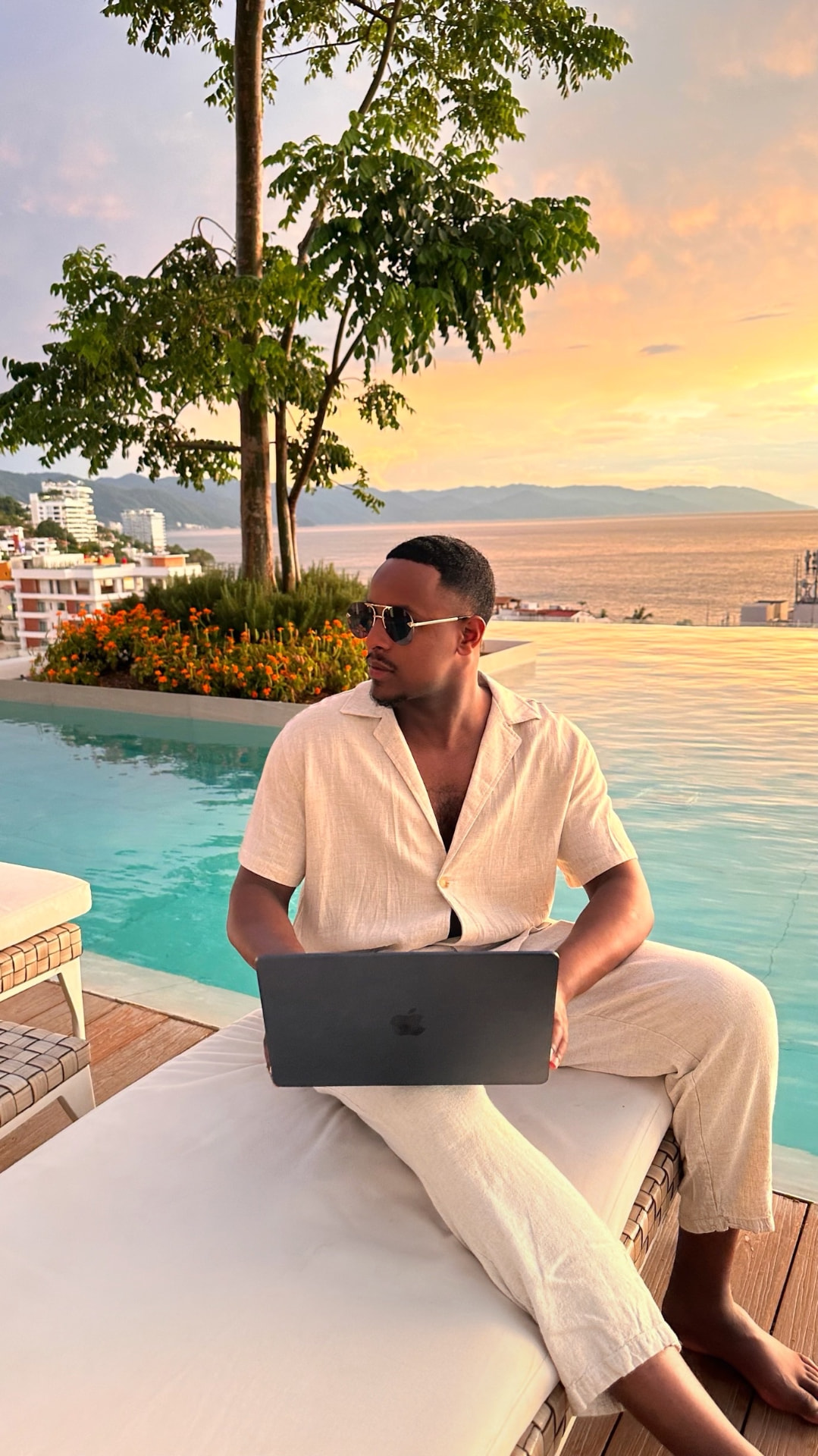 Hassan building brands from a poolside at sunset